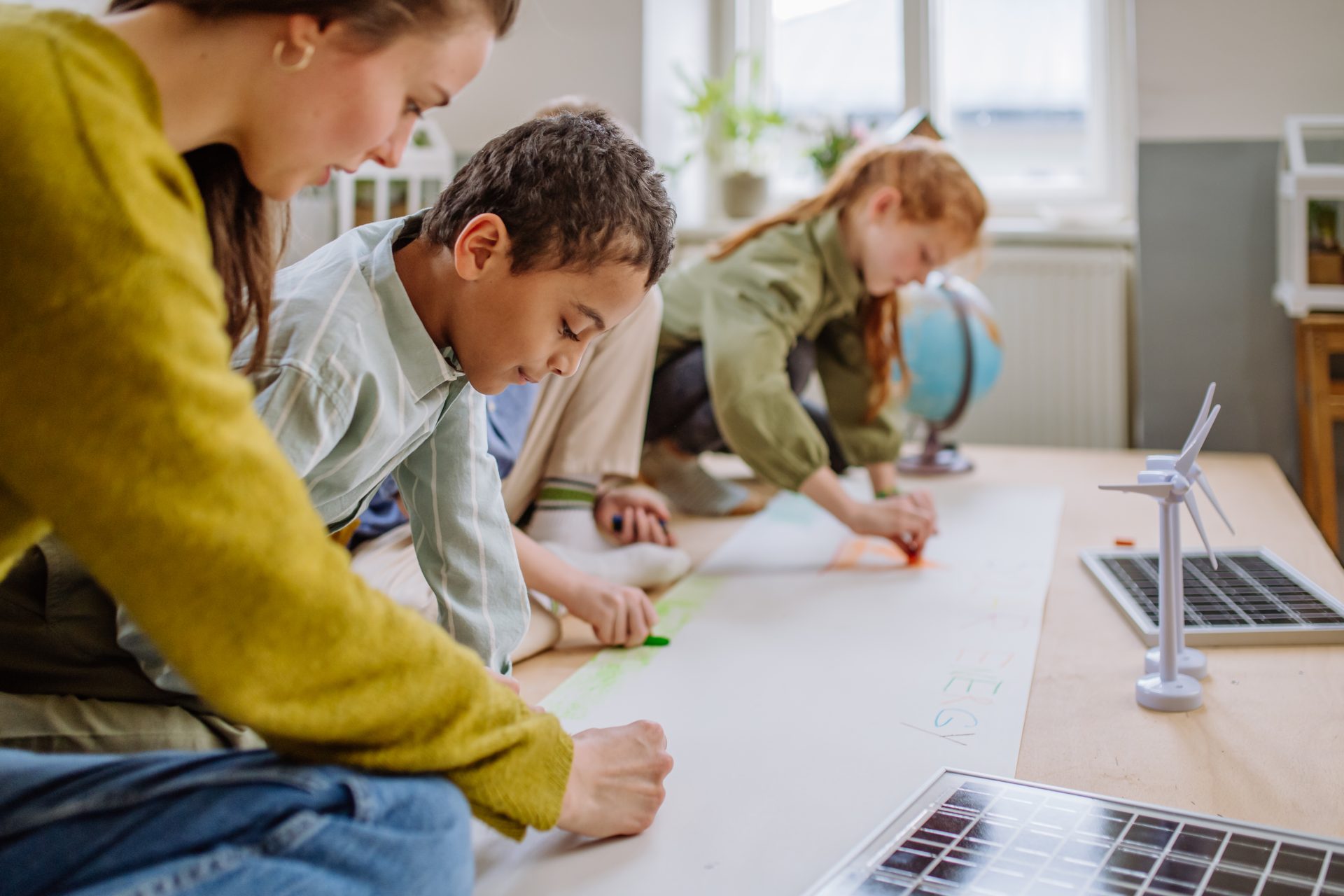 children-drawing-a-project-to-environmental-lesson-2023-11-27-04-50-24-utc